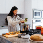 Skilled home cook preparing fresh and delicious meals in kitchen