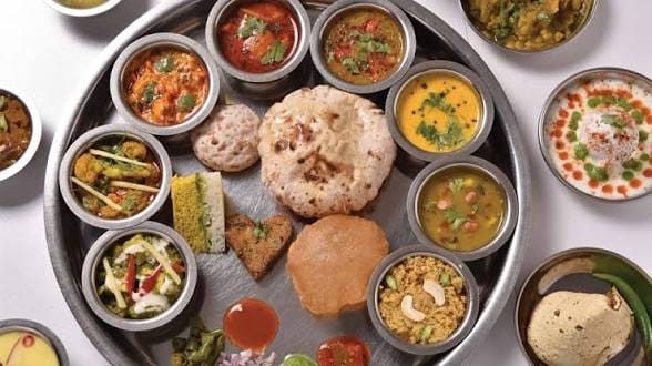 North Indian thali with roti dal sabzi prepared by daily home cook